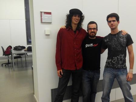 Left to right: Marcel Farrés, Pedro Vílchez and Diego Iruela, at the HackLab's door