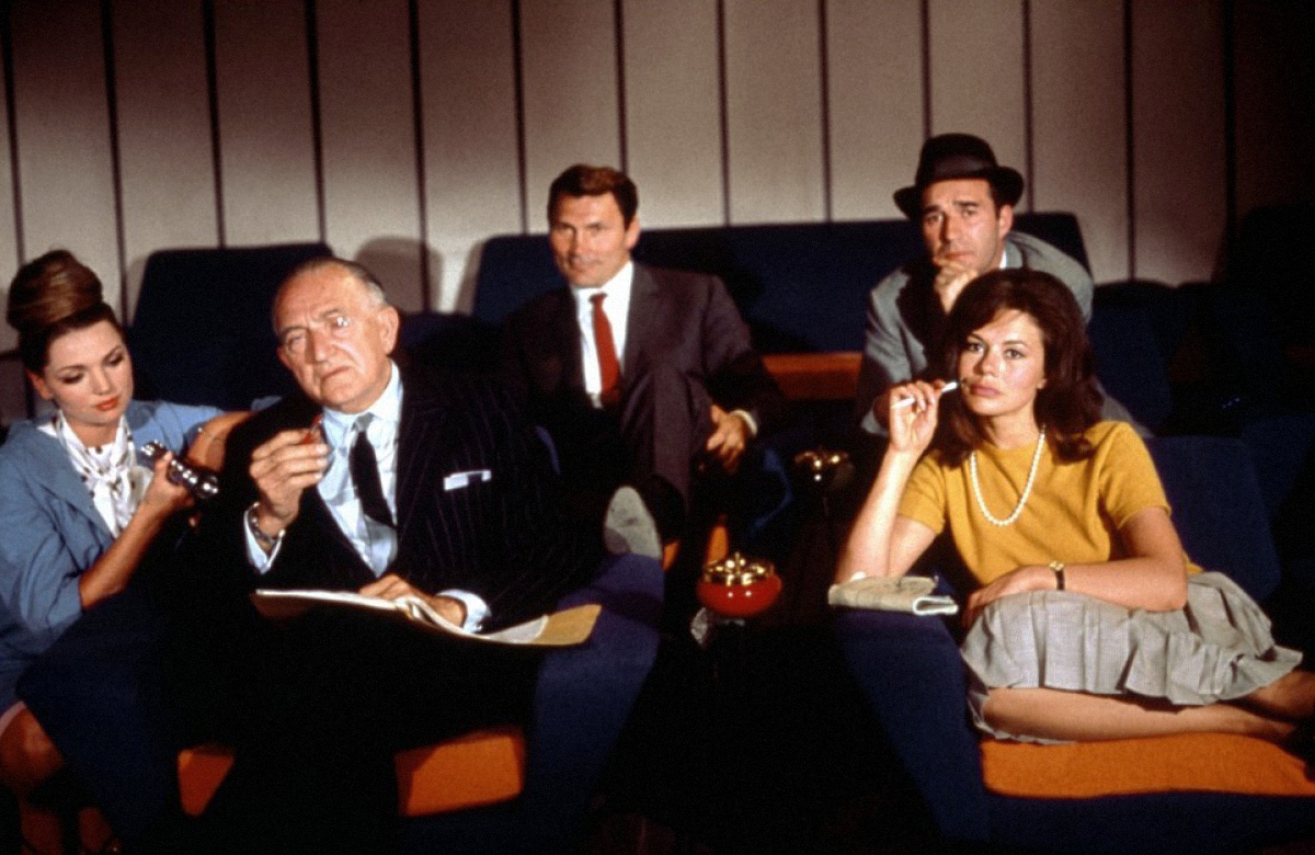 Fritz Lang, Jack Palance, Michel Piccoli i Giorgia Moll a Le Mépris (1963), de Jean-Luc Godard. Fritz Lang, Jack Palance, Michel Piccoli i Giorgia Moll a Le Mépris (1963), de Jean-Luc Godard.