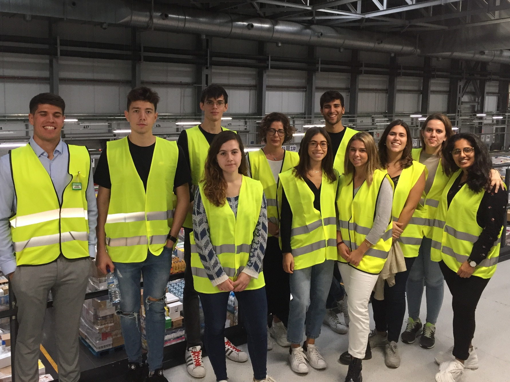 Business Logistics undergraduate students visiting a Mercadona warehouse